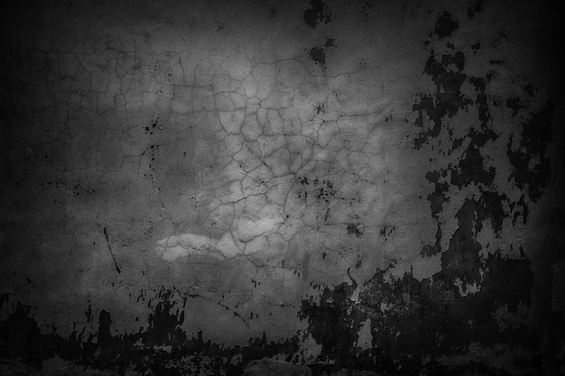 Textura escura de uma parede de cimento, fundo urbano preto