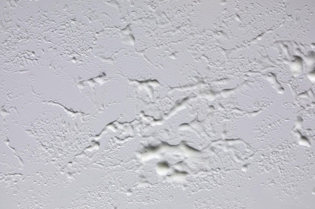 Textura de espuma de jabón blanca con burbujas fondo gris abstracto gel de ducha de jabón champú crema facial muestra de mousse de limpieza