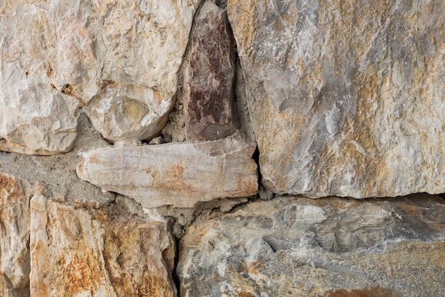 la textura sin fisuras de la pared de roca