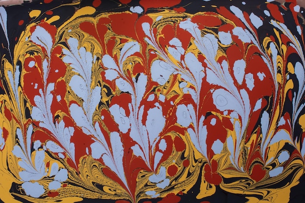Textura de fondo abstracto con pintura jaspeada de Ebru con motivos florales