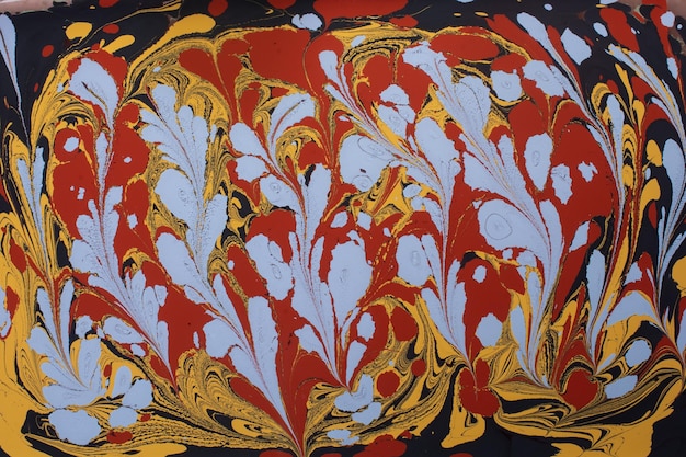 Textura de fondo abstracto con pintura jaspeada de Ebru con motivos florales