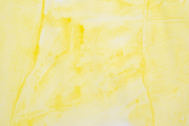 Textura de fondo de acuarela amarilla abstracta de cerca