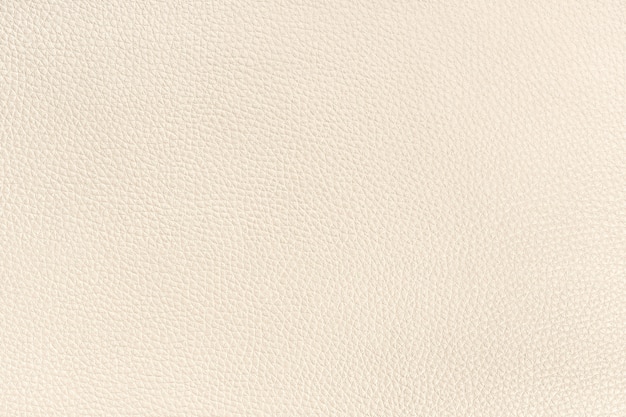 Textura de fondo de cuero beige. Fotograma completo