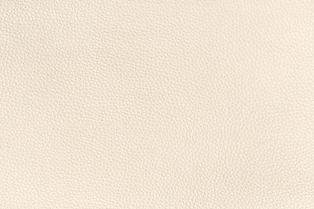 Textura de fondo de cuero beige. Fotograma completo