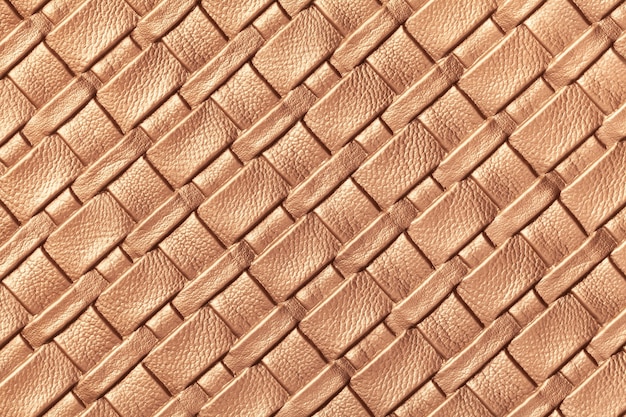 Textura de fondo de cuero marrón claro con patrón de mimbre, macro. Telón de fondo abstracto de textil beige decorativo moderno con líneas diagonales.