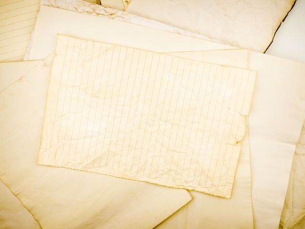 Foto textura de fondo de grunge de papel amarillento