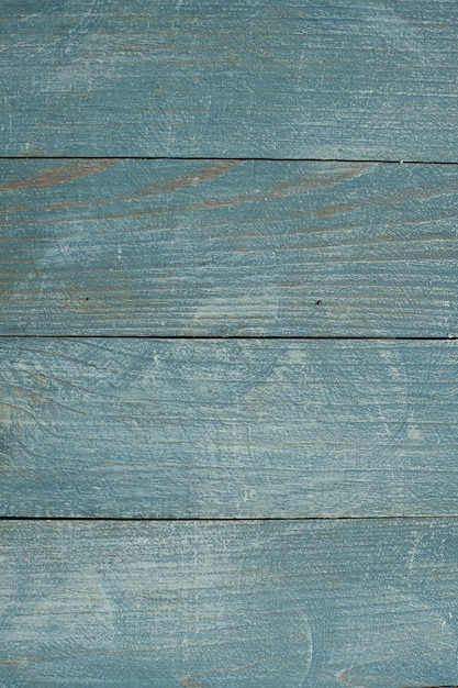 Textura de fondo de madera de color vintage con nudos y agujeros de clavos.