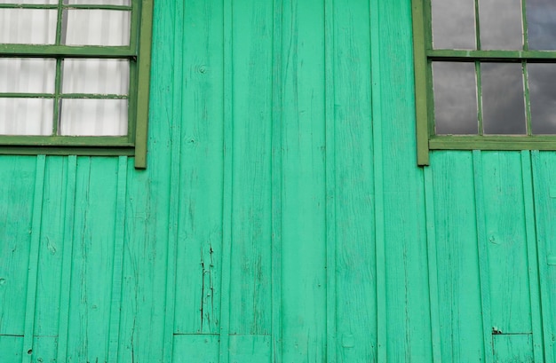 Textura de fondo de madera rústica envejecida en verde.