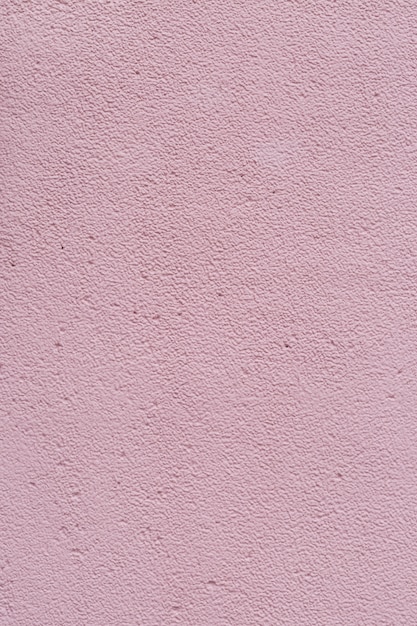 Foto textura de fondo de muro de hormigón de cemento rosa