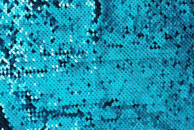 Textura de fondo de onda de brillo azul de lentejuelas macro