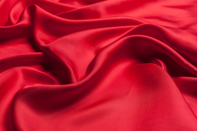 Textura de fondo de ondas de tela roja