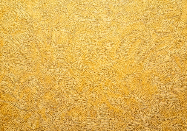 Textura de fondo de oro. Papel pintado en la pared. Elemento de diseño.