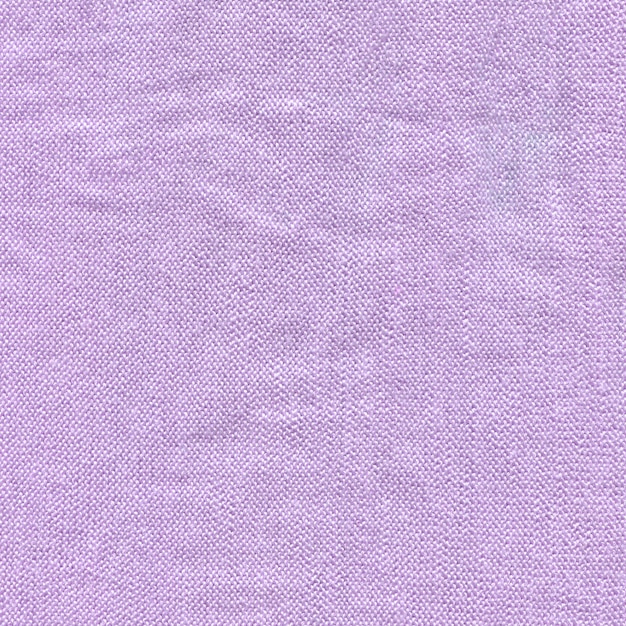 Textura de un fondo de pantalla de suéter violeta de punto