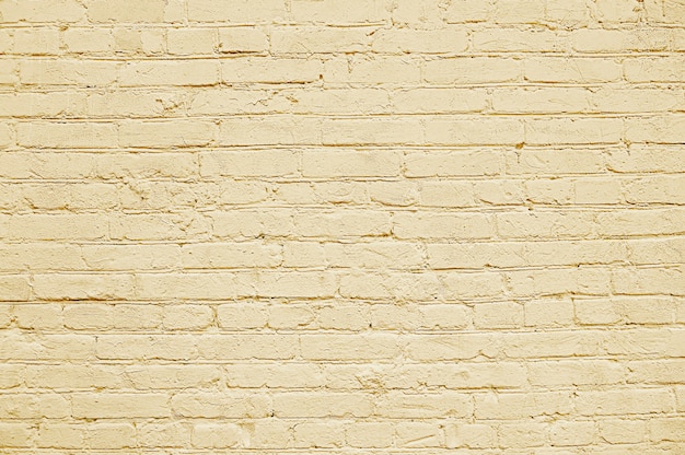 Foto textura de fondo de pared de ladrillo beige