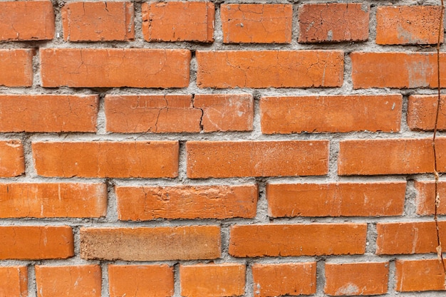 Foto textura de fondo de pared de ladrillo rojo antiguo