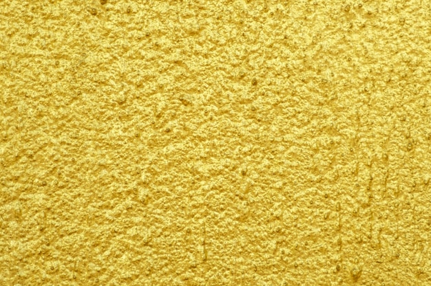 Foto textura de fondo de la pared de oro