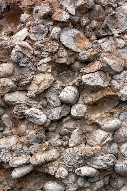 Textura de fondo de piedras en la roca Vertical