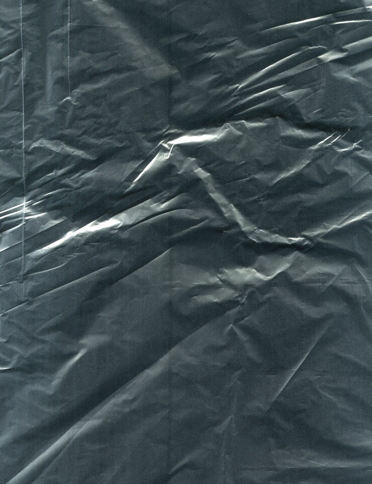 Foto textura de fondo de polietileno oscuro