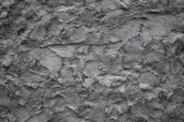 Textura del fondo de una superficie áspera gris.