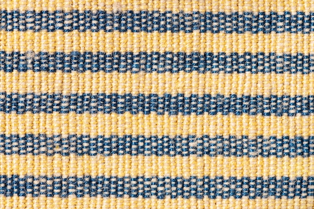 Textura de fondo de tela amarilla y azul. Fotograma completo