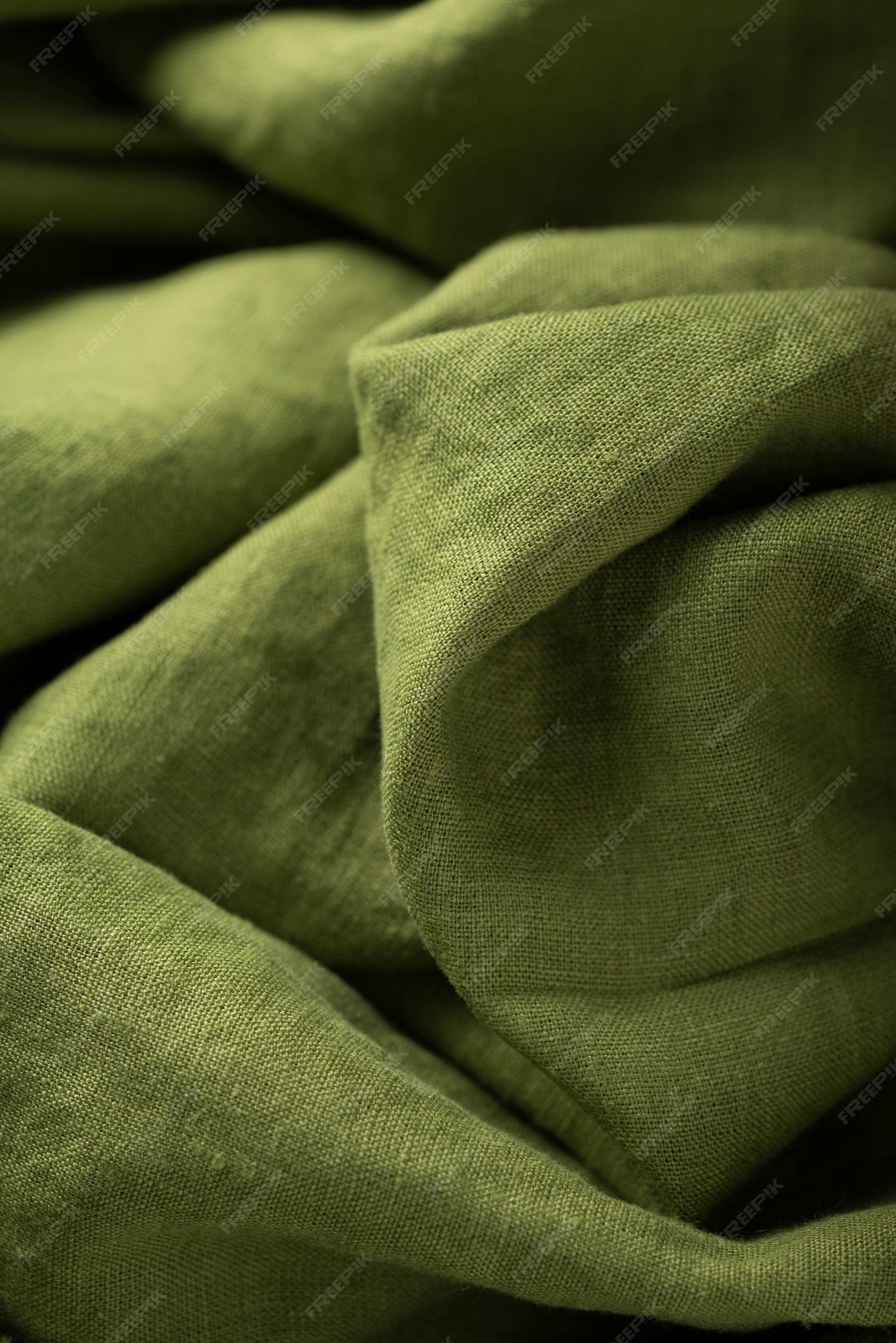 caldera seguramente Contaminado Textura de fondo de tela de lino en color verde. concepto de costura | Foto  Premium