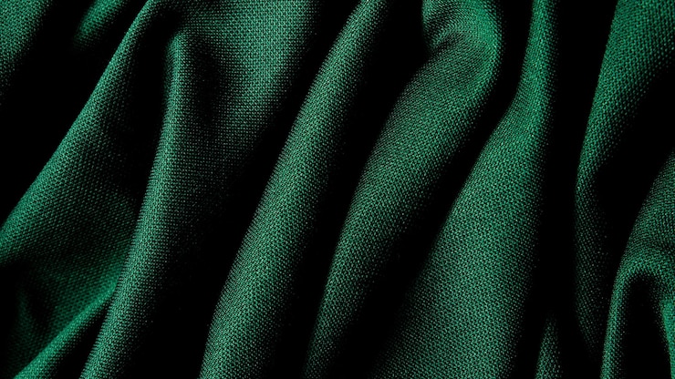 Foto textura de fondo de tela verde