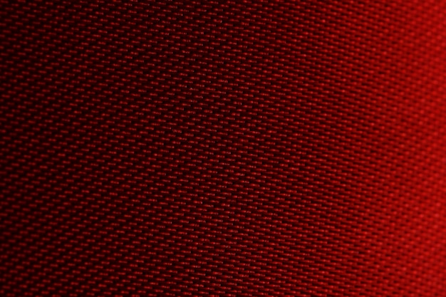 Foto textura y fondo textil rojo de primer plano en fotos macro