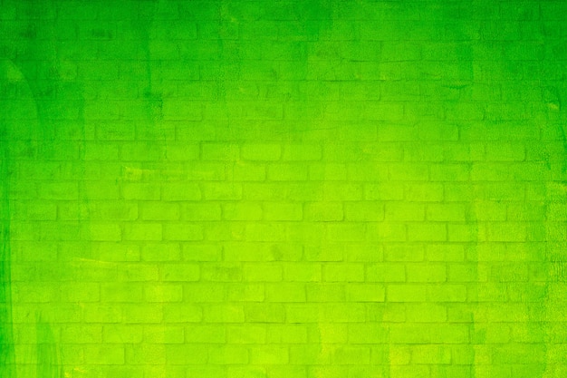 Textura y fondo verdes de la pared de ladrillo.