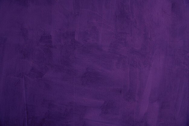 Foto textura de fondo violeta de la pared vieja