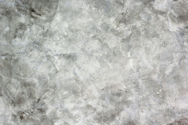 La textura de fondo del yeso de cemento es blanco y gris crudo.