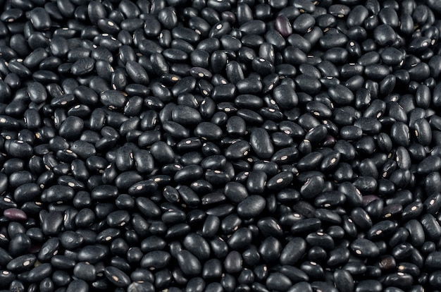 Foto textura de frijoles negros crudos