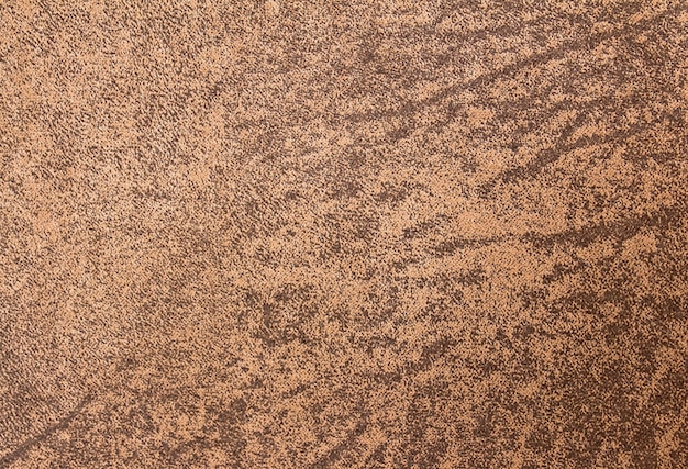 Textura de gamuza marrón de tela, vista superior.