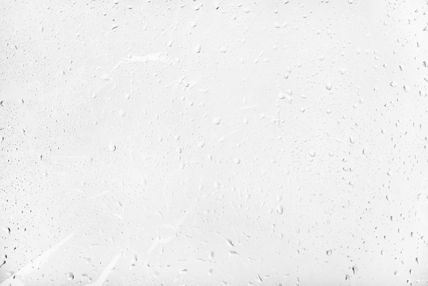 Textura de gota de agua sobre vidrio gris