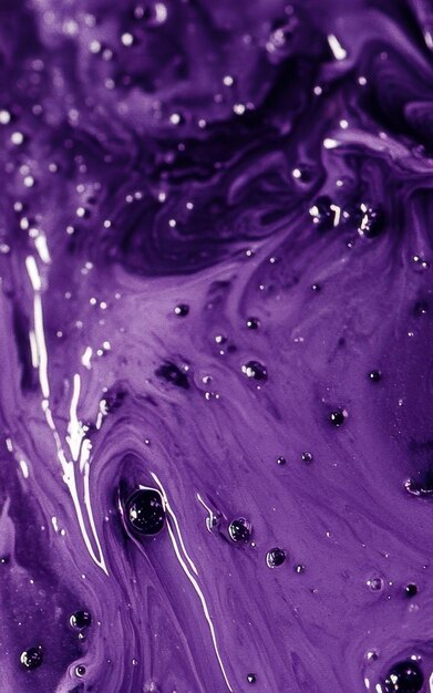 Textura de las gotas de tinta de color púrpura profundo