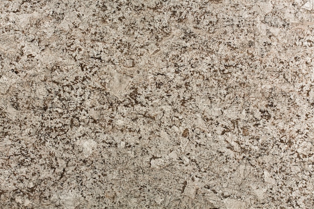 Textura de granito beige y marrón de lujo. Foto de alta resolución.