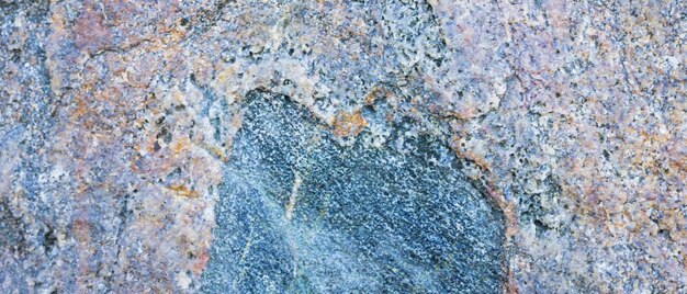 Textura de granito Rocas de granito con superficie porosa Fondo de piedra sólida