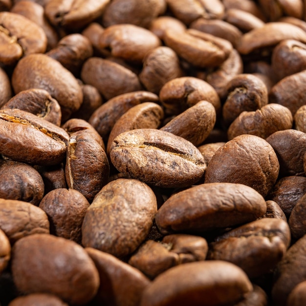 Textura de granos de café tostados bebida aromática y energética.