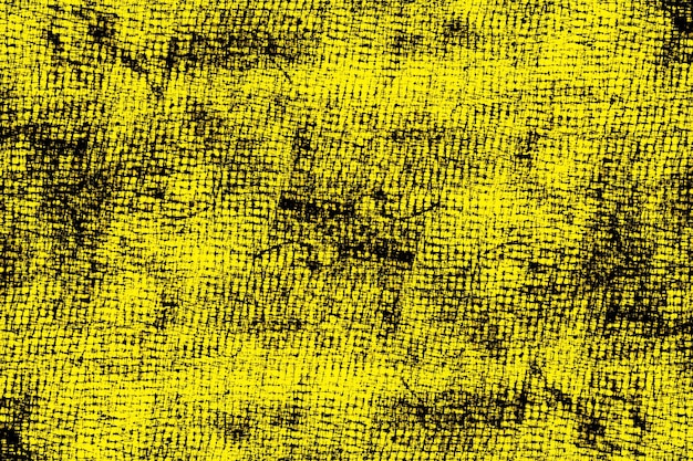 Textura grunge abstracto angustiado sobre fondo amarillo