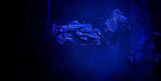 Textura grunge azul oscuro aterrador para el concepto de horror de pared azul oscuro de fondo