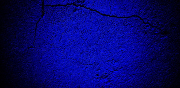 Textura grunge azul oscuro aterrador para el concepto de horror de pared azul oscuro de fondo