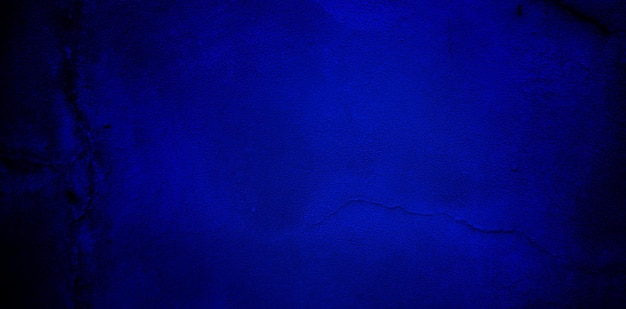 Textura grunge azul oscuro aterrador para el concepto de horror de pared azul oscuro de fondo