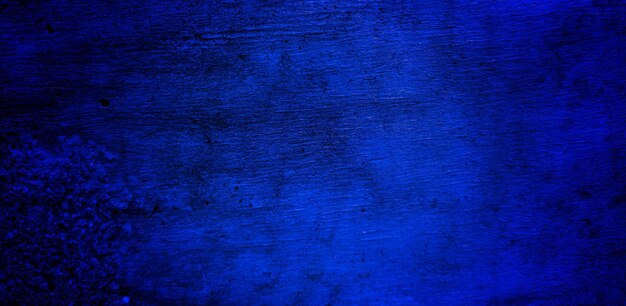 Textura grunge azul oscuro aterrador para el concepto de horror de pared azul oscuro de fondo