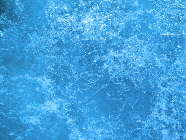 Foto textura helada. hermoso hielo con grietas. superficie de hielo. foto de alta calidad