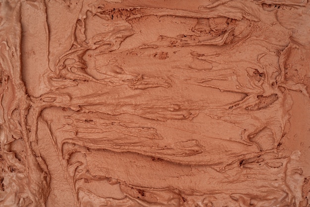 Foto textura de helado de chocolate. vista superior. deliciosa golosina fresca.