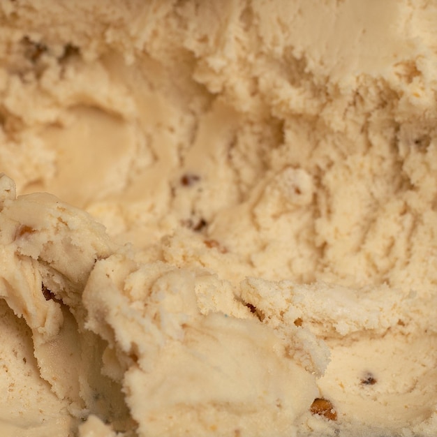 Textura de helado cremoso de vainilla con nueces