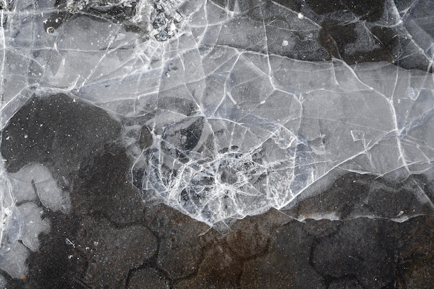 Textura de hielo agrietado. Vista superior. Hielo roto en el suelo