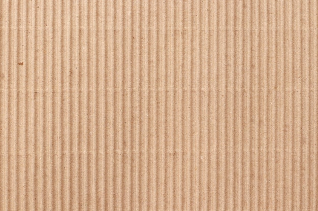 Foto textura de hoja de cartón marrón de caja de papel reciclado