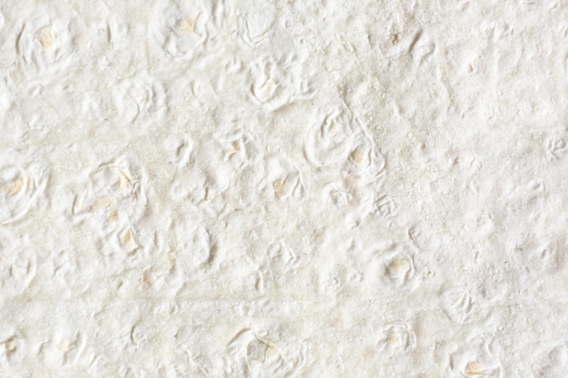 Foto textura de hoja de masa beige de fondo natural de pan lavash armenio