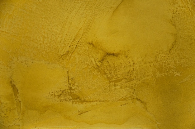 Textura de un hormigón amarillo como fondoPared amarilla grungy Grandes texturas para el fondo