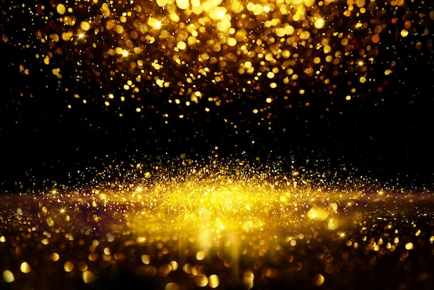 Textura de iluminación de bokeh de brillo dorado Fondo abstracto borroso para cumpleaños, aniversario, boda, víspera de año nuevo o Navidad.